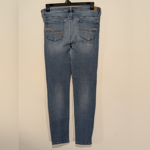 VERY USED AMERICAN EAGLE DISTRESSED LIGHT BLUE REGULAR JEAN SIZE 12 - Picture 3 of 7